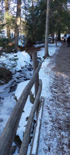 a wooden fence with snow on the ground at Marlingsuites - Vinea - Wieser Josef - Marling in Marlengo
