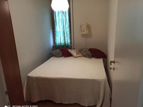 Posteľ alebo postele v izbe v ubytovaní Appartamento situato nei pressi di centro e Caserma