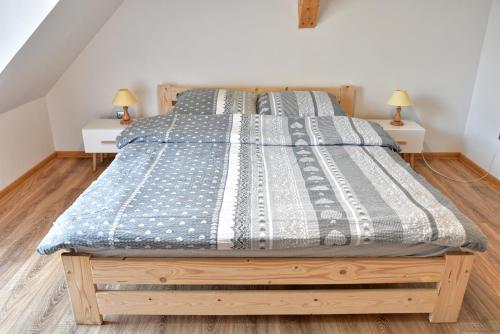 En eller flere senge i et værelse på Agroturystyka Trzy Siostry