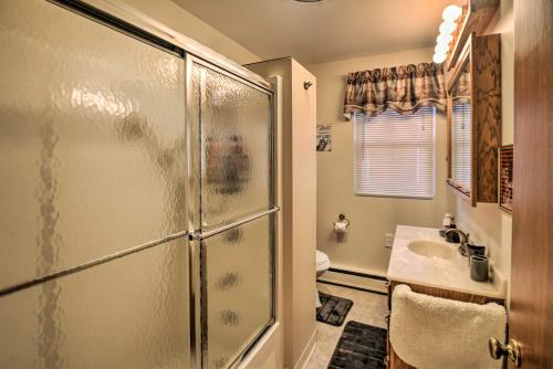 a bathroom with a shower and a sink at Cozy Berlin Getaway, ATV from the Driveway in Gorham
