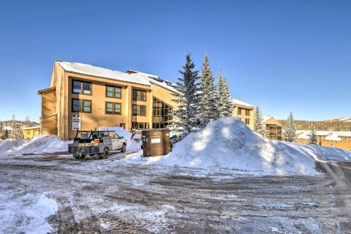a pile of snow in front of a building at Resort-Style Brian Head Condo Near Slopes! in Brian Head