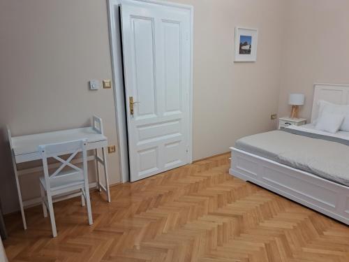 Posteľ alebo postele v izbe v ubytovaní Soltész Grand Residence