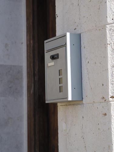 a electrical box on the side of a building at Las Calendas de Atapuerca CB in Castrillo del Val