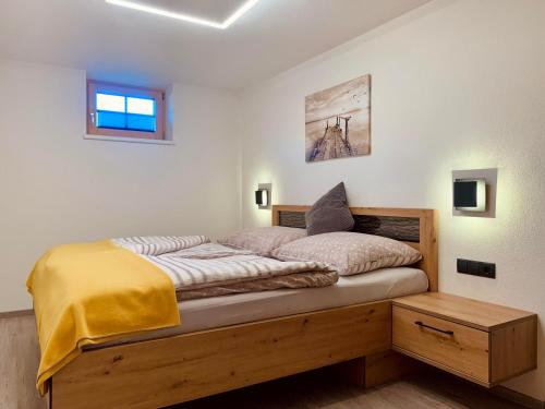 Posteľ alebo postele v izbe v ubytovaní Apartment Silberwald
