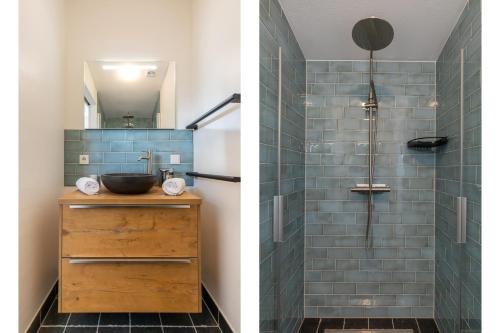 W łazience znajduje się umywalka i prysznic. w obiekcie Vakantiehuis Noordweg 4a, Oostkapelle w mieście Oostkapelle