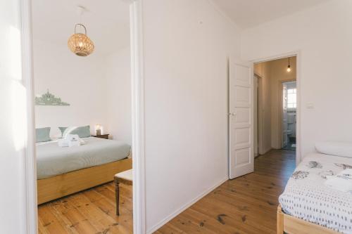 Säng eller sängar i ett rum på Best Houses 56 - Charming House in Peniche