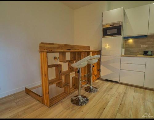 Cuisine ou kitchenette dans l'établissement Magnificent One Bed Room Appartement options Clim et parking