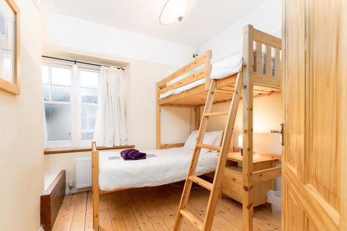 Krevet ili kreveti na kat u jedinici u objektu Rhos Cottage