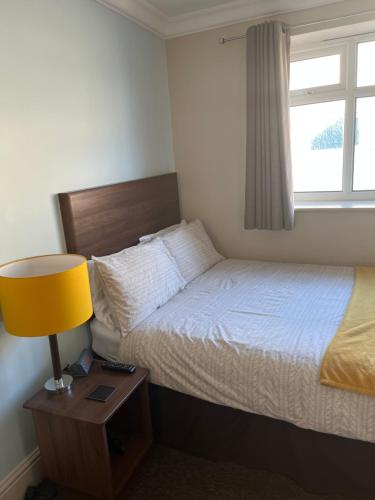 Ένα ή περισσότερα κρεβάτια σε δωμάτιο στο Armada Apartment
