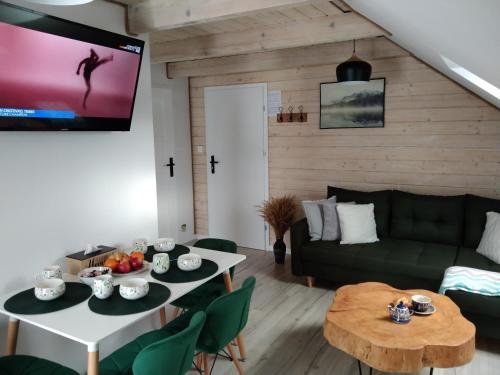 Posedenie v ubytovaní Apartamenty Równia 2