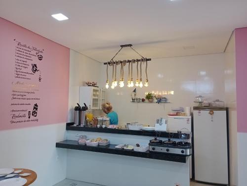 Køkken eller tekøkken på Pousada Duende Feliz