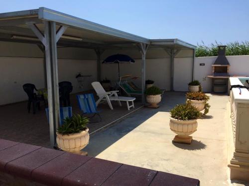 Αίθριο ή υπαίθριος χώρος στο Villa with pool in Punta Prosciutto, 120 m², play area