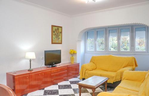 Televízia a/alebo spoločenská miestnosť v ubytovaní Apartamento Plaza la Fuente