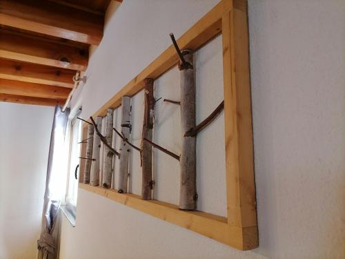 a row of windows on a wall in a room at Domaine les lodges nature ,private wellness in Soultzeren