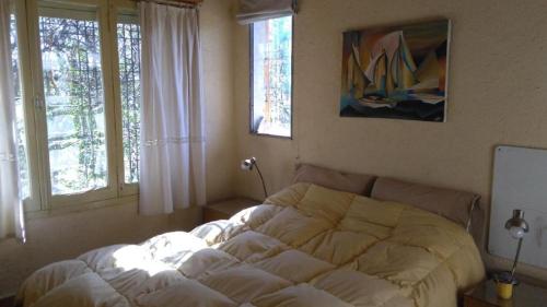 Una cama o camas en una habitación de El Chaparral