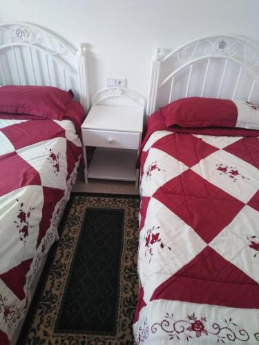Ein Bett oder Betten in einem Zimmer der Unterkunft Mediyq