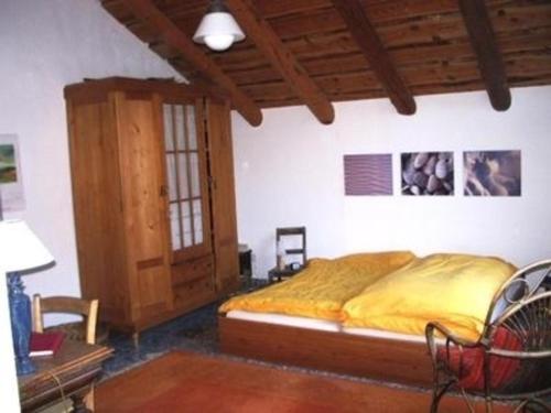 Ένα ή περισσότερα κρεβάτια σε δωμάτιο στο Casa Cresmino