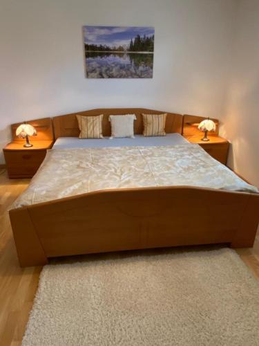 Postel nebo postele na pokoji v ubytování Ferienwohnung Pyhrgasblick
