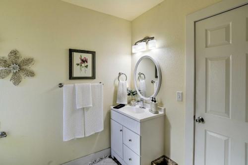 a bathroom with a sink and a mirror at Ideally Located Chico Home - Fire Pit and Grill in Chico