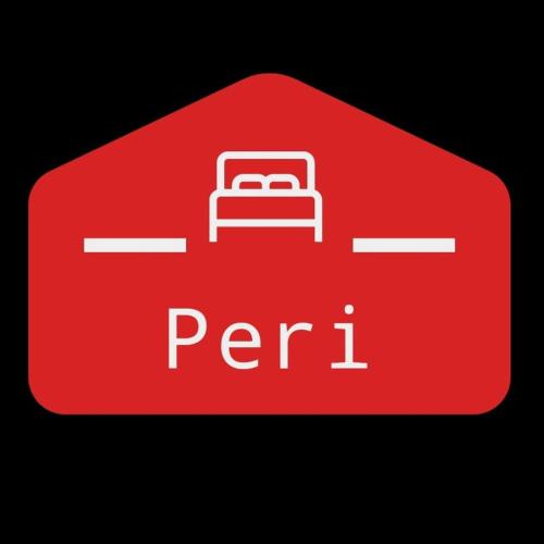 Peri Suit Tunceli في تونجيلي: سيارة حمراء عليها علامة peri