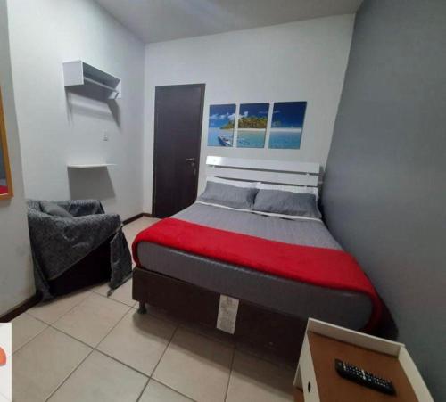 Een bed of bedden in een kamer bij Pousada Praia do Recreio