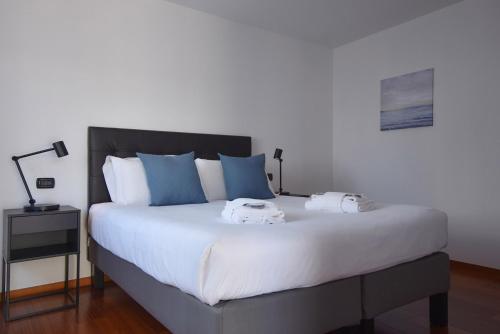 سرير أو أسرّة في غرفة في Padova Business Luxury Terrace