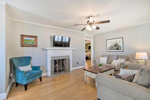 a living room with a couch and a fireplace at Less Than 2 Mi to University! Convenient Columbia Home in Columbia