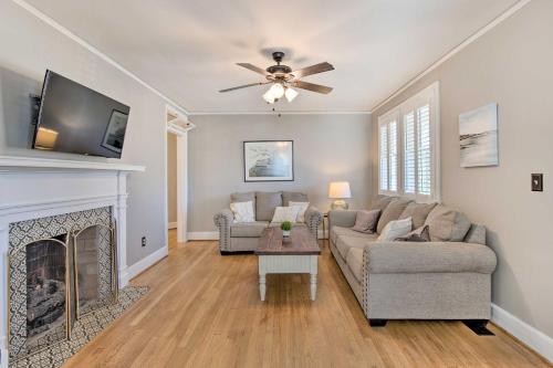 a living room with a couch and a fireplace at Less Than 2 Mi to University! Convenient Columbia Home in Columbia