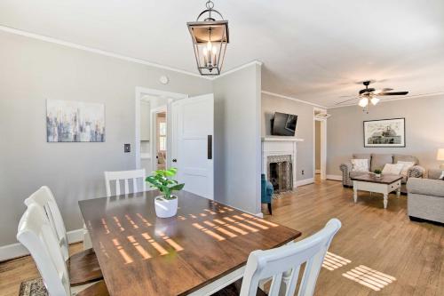 a dining room and living room with a table and chairs at Less Than 2 Mi to University! Convenient Columbia Home in Columbia