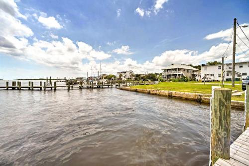 a body of water with houses and a dock at Historic Swansboro Studio with Intracoastal View! in Swansboro
