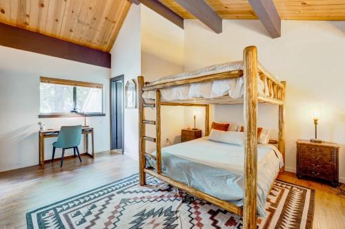 a bedroom with a bunk bed and a desk at Alder Grove in Incline Village