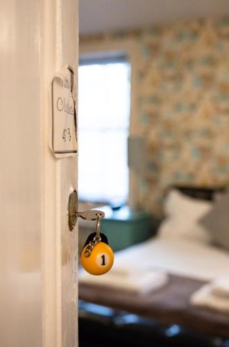 a door knob with a pumpkin on it at Laburnum Guest House at Bistro En Glaze in Wylam