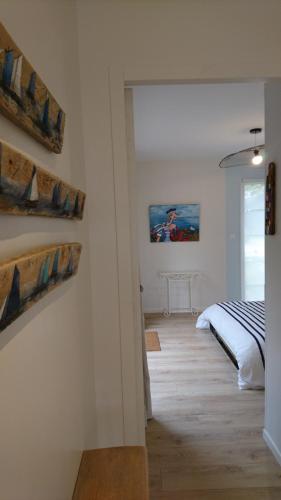 a bedroom with a bed in a room at Au gré des marées in Roscoff