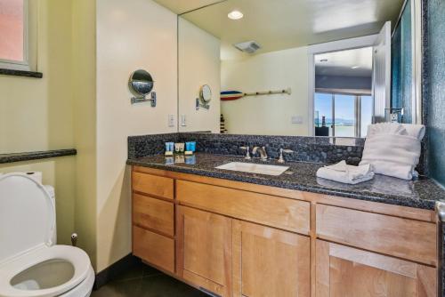 a bathroom with a sink and a toilet at Private Beach, Pool Table, Close To Everything in South Lake Tahoe