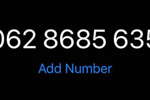 a close up of an ad number on a black background at Cottage House Official in Niš