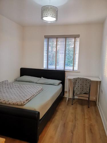 Ένα ή περισσότερα κρεβάτια σε δωμάτιο στο Langley Haven - 3 BR House