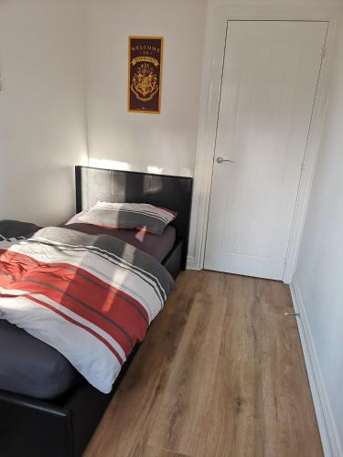 Ένα ή περισσότερα κρεβάτια σε δωμάτιο στο Langley Haven - 3 BR House