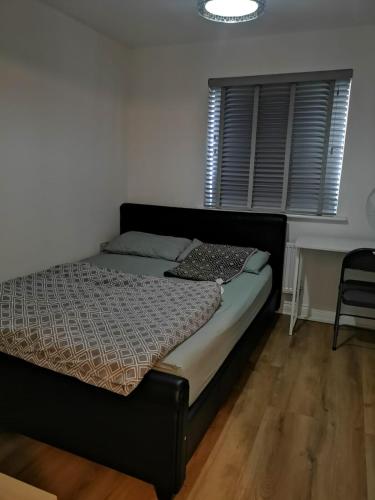 Ένα ή περισσότερα κρεβάτια σε δωμάτιο στο Langley Haven - 3 BR House