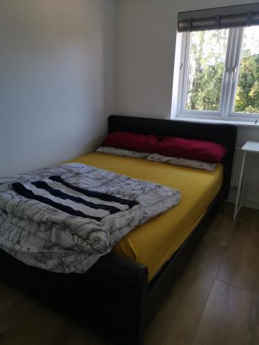Ένα ή περισσότερα κρεβάτια σε δωμάτιο στο Langley Haven - 3 BR House