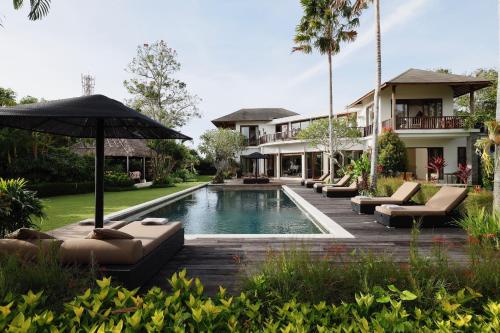 an image of a villa with a swimming pool at Villa Uma Nina by Nakula in Jimbaran
