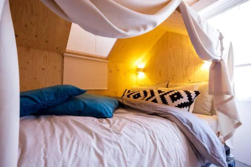 Postel nebo postele na pokoji v ubytování Hotel Ougien