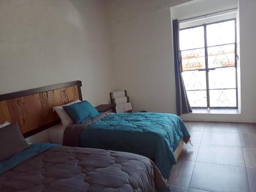 Postel nebo postele na pokoji v ubytování El Salto de Camela - Vera y Espín Hostal