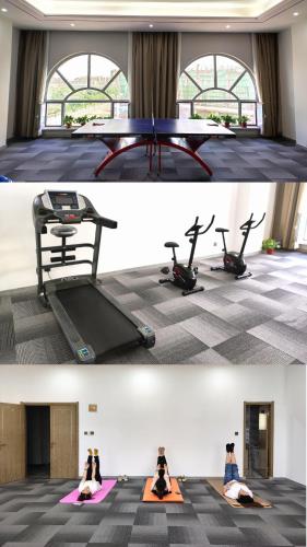 Zhangye KAI RUI Hotelにあるフィットネスセンターまたはフィットネス設備