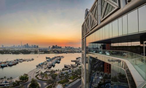 a view of a harbor from a building at Al Bandar Arjaan by Rotana – Dubai Creek in Dubai