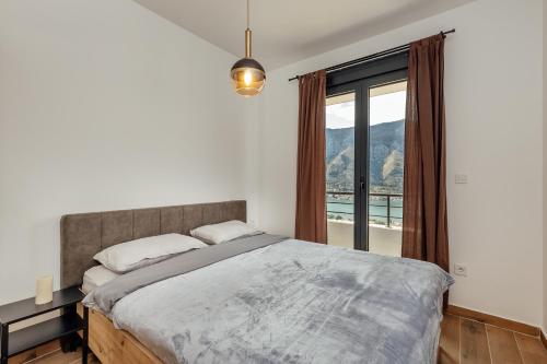 Postel nebo postele na pokoji v ubytování LANA Sea View Apartment