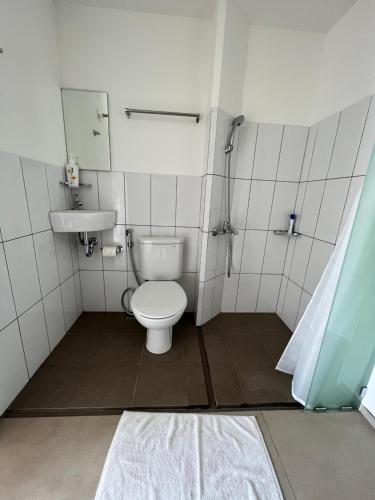 Kúpeľňa v ubytovaní Naiika CoLiving