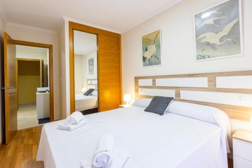 Katil atau katil-katil dalam bilik di Apartagal-Ed Batel Foz
