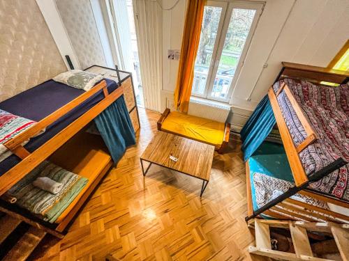Postel nebo postele na pokoji v ubytování Bao Hostel Kutaisi