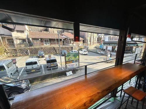 a view of a city street from a window at Kototoki - En - in Gotsu