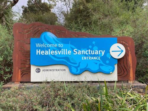 a sign for the hellesley wildlife sanctuary entrance at Mon Desir in Chum Creek